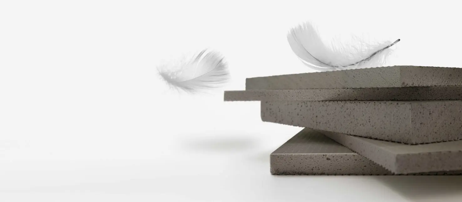 Rappauslevy tuulettuville julkisivuille: StoCarrier Aero, kevyt, pino harmaita levyjä