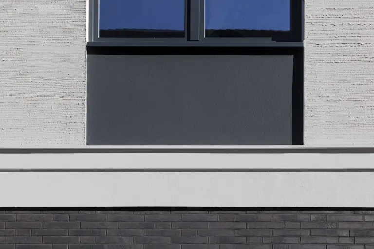 Facade design with external render, facade paint, bricks, and three-dimensional facade elements on EWIS.