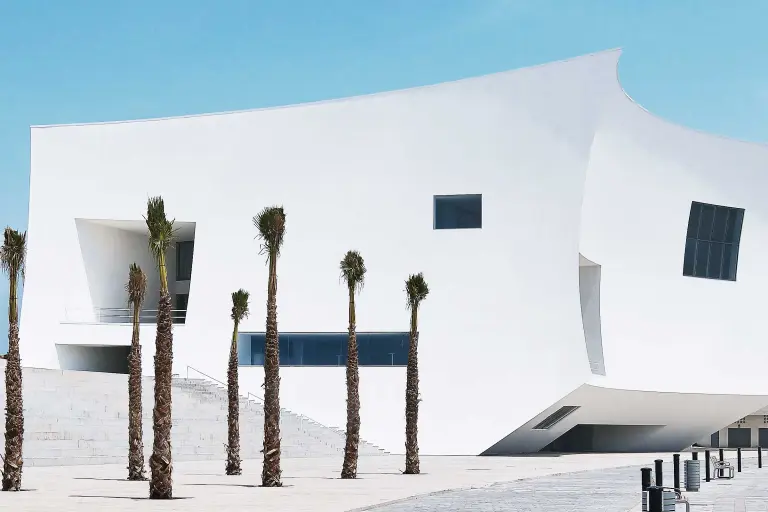 RSC in harmony: the ventilated facade of a concert hall in Spain, white StoVentec R rendered facade