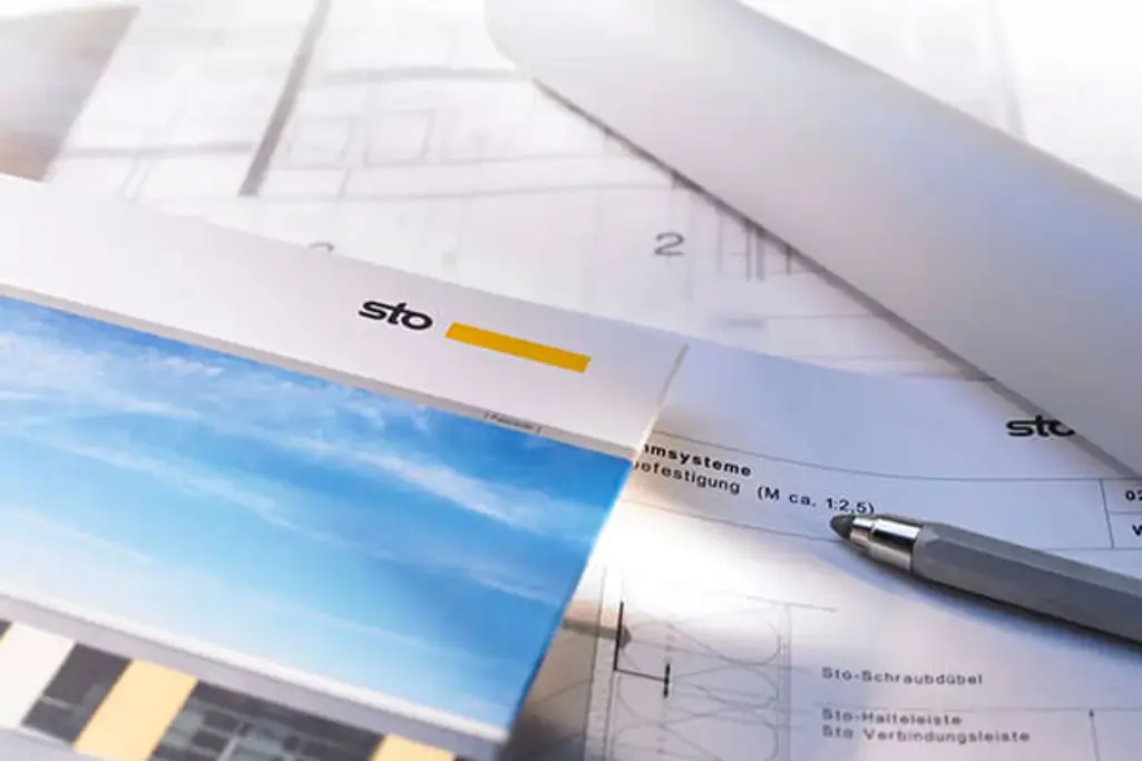 Rakennuspiirustuksia, kynä ja esite